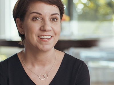 A women smiling as she tells her CPAP therapy story