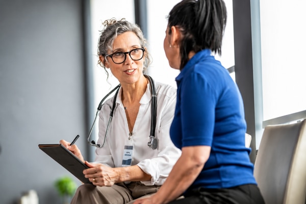  Doctor Consulting with Patient