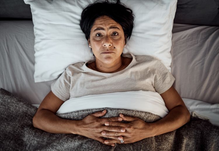 Woman laying in bed