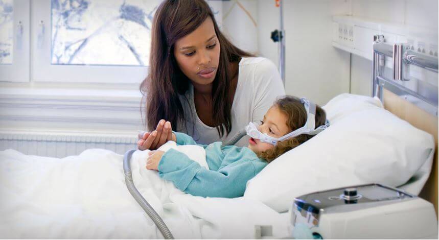 Child in hospital with caregiver ResMed